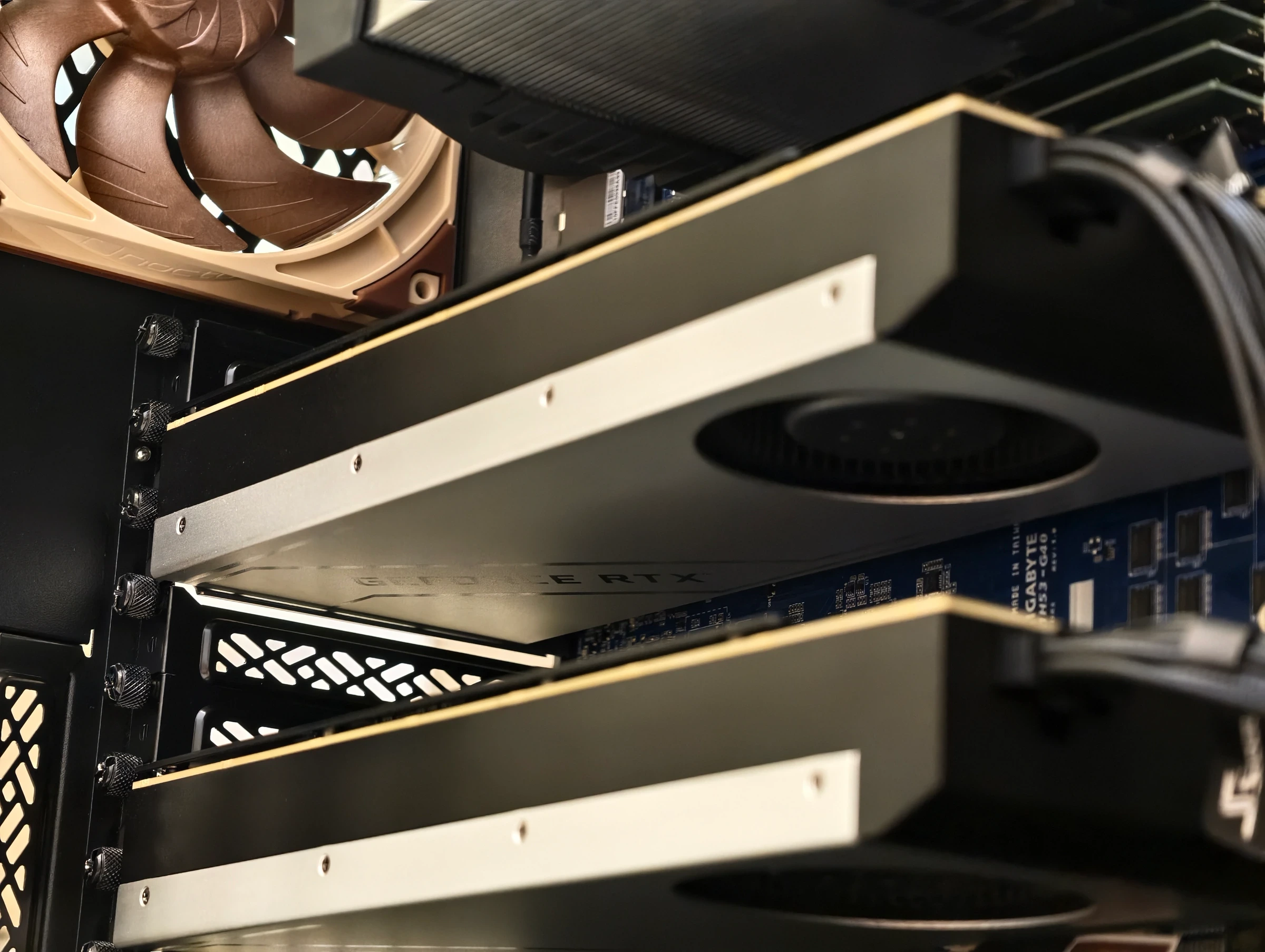 Two NVIDIA GeForce RTX 4090 - 48GB cards installed side by side in the PCIe slots of a server board