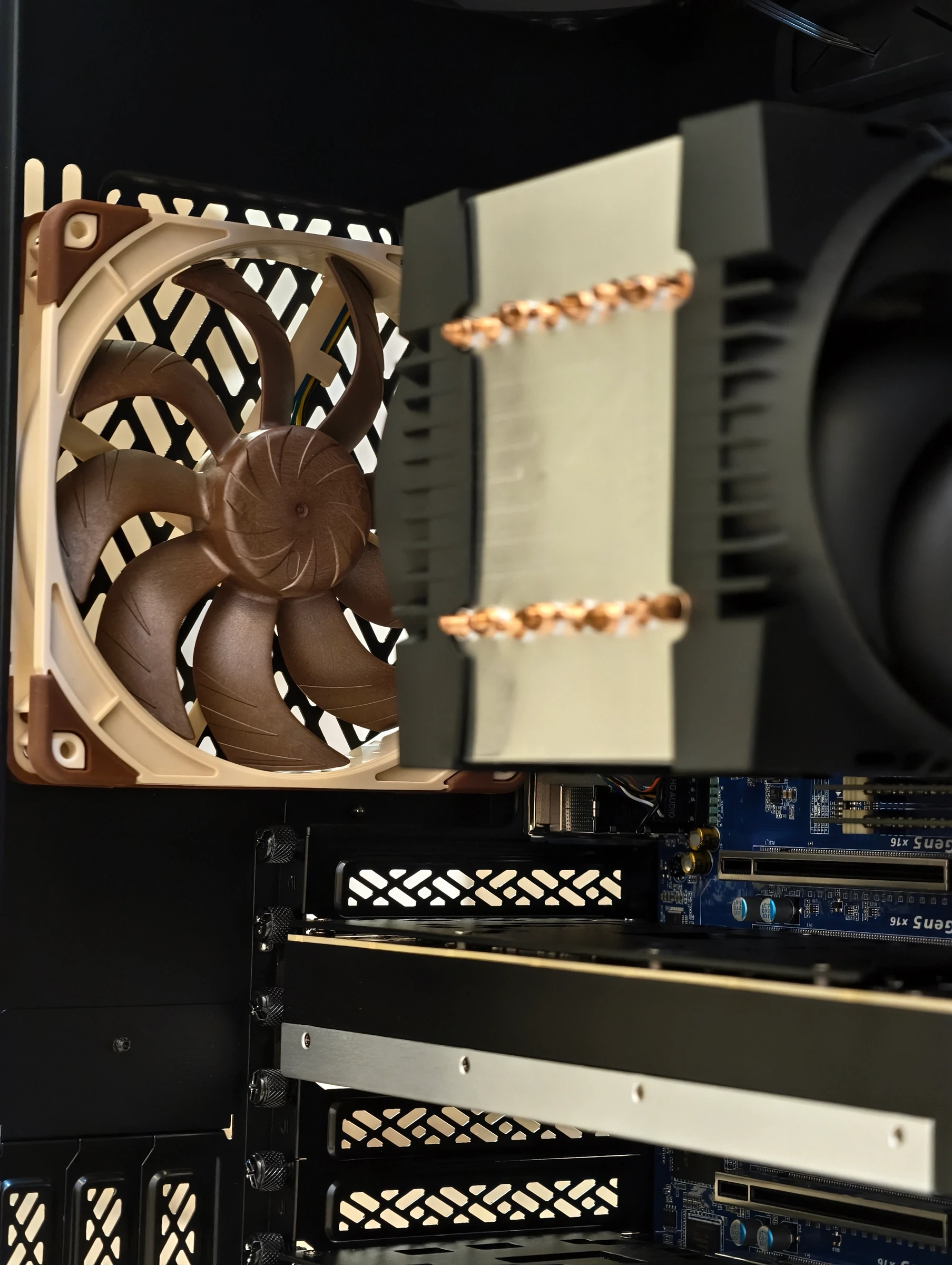 Close view of the clearance left above the second GPU, with case airflow cutouts alongside it